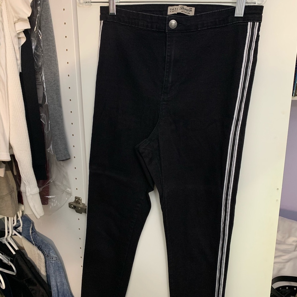 stripped black jeans